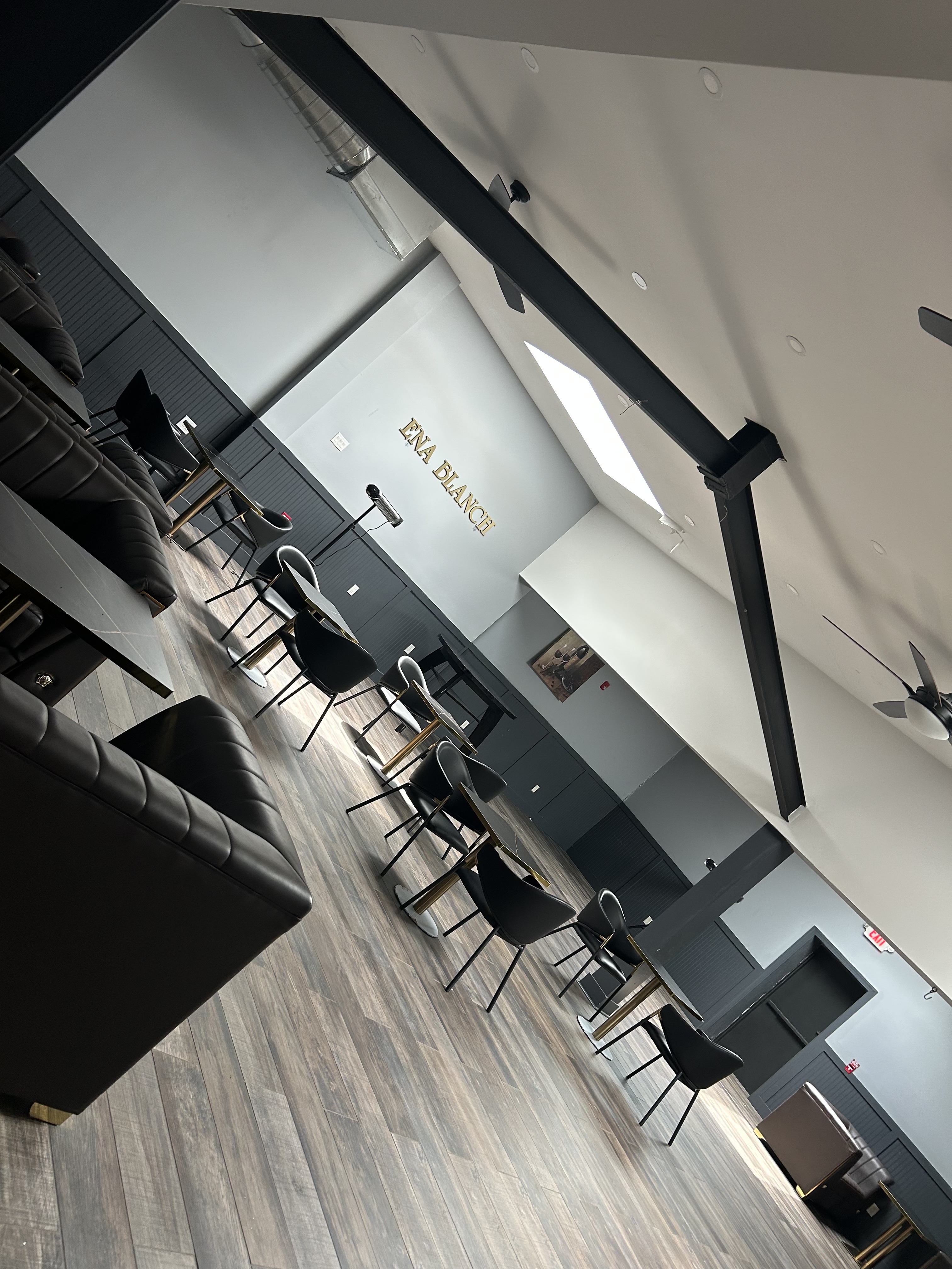 EnaBlanche Ballroom — black marble bar with gold veining